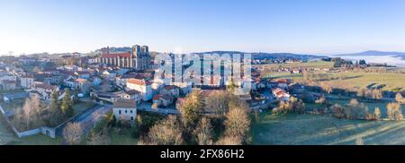 France, Haute Loire, La Chaise Dieu, Livradois Forez Regional Natural Park, village with Saint Robert abbatial church (aerial view) // France, Haute-L Stock Photo