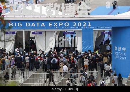 (210526) -- GUIYANG, May 26, 2021 (Xinhua) -- Visitors enter the venue of the China International Big Data Industry Expo 2021 in Guiyang, southwest China's Guizhou Province, May 26, 2021. The China International Big Data Industry Expo 2021 opened here on Wednesday, showcasing cutting-edge scientific and technological innovations and achievements in the relevant area. Under the theme 'Embrace digital intelligence, Deliver new development,' this year's expo is scheduled both online and offline. The expo will witness six high-level dialogues to discuss topics such as data security, digital serv Stock Photo