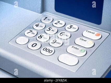 ATM cash machine pin pad, keypad detail, object closeup, nobody. Key pad, number keyboard on a modern atm up close. Withdrawing money, funds, making a Stock Photo