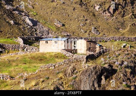 Small home building in Vilcanota mountains or Ausangate mountains, Peruvian Andes Stock Photo