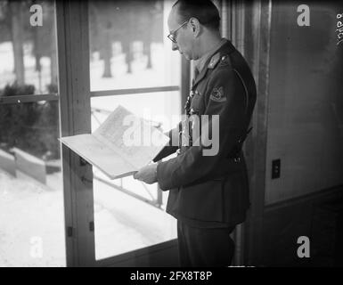 Captain Rutten with birth register and birth certificate, February 19, 1947, birth certificates, The Netherlands, 20th century press agency photo, news to remember, documentary, historic photography 1945-1990, visual stories, human history of the Twentieth Century, capturing moments in time Stock Photo