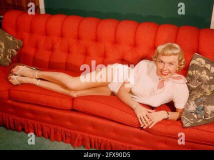 DORIS DAY (1922-2019) American film actress and singer about 1957 Stock Photo