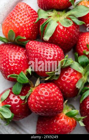 Fresh summer strawberries as background, closeup view. Red berries, home grown organic strawberries Stock Photo