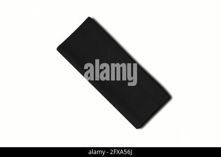 Folded black cotton napkin isolated on white background Stock Photo
