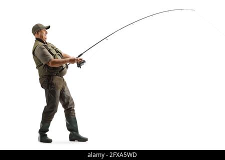 1920s MAN ANGLER FLY FISHING CASTING WITH ROD REEL CREEL AND LANDING NET -  a454 HAR001 HARS SPIRITUALITY ANGLER B&W FREEDOM ACTIVITY DREAMS HAPPINESS  PHYSICAL STRENGTHENING ADVENTURE LEISURE STRENGTH SELF ESTEEM EXCITEMENT