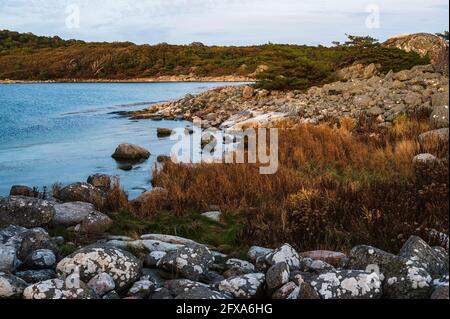 Coastal scenery in evening light Stock Photo