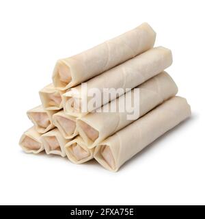 Heap of raw frozen Vietnamese egg rolls isolated on white background Stock Photo