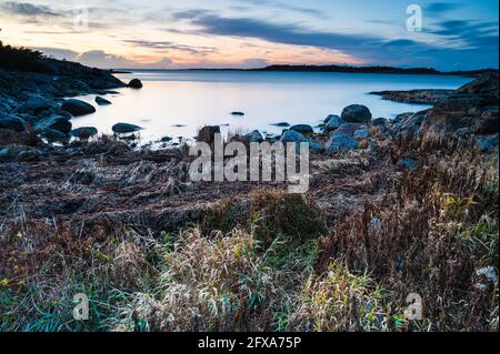 Coastal scenery in evening light Stock Photo