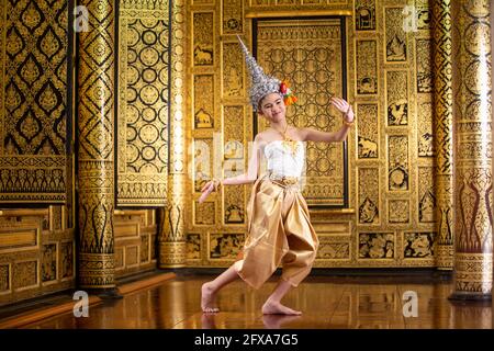 Thai traditional dress. Young kid Actors performs Thai ancient dancing Art of Thai classical dance in Thailand Stock Photo