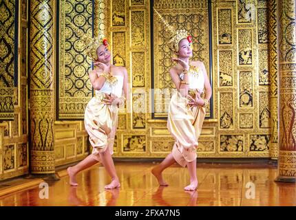 Thai traditional dress. Young kid Actors performs Thai ancient dancing Art of Thai classical dance in Thailand Stock Photo