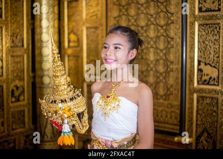 Thai traditional dress. Young kid Actors performs Thai ancient dancing Art of Thai classical dance in Thailand Stock Photo