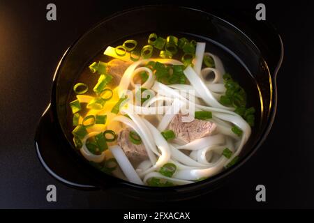 Chinese soup with beef and noodles Stock Photo