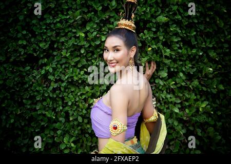 Beautyful Thai woman wearing thai traditional clothing, Beautiful woman, Thai national costume, traditional Thai dress, Thai woman, good mood Stock Photo