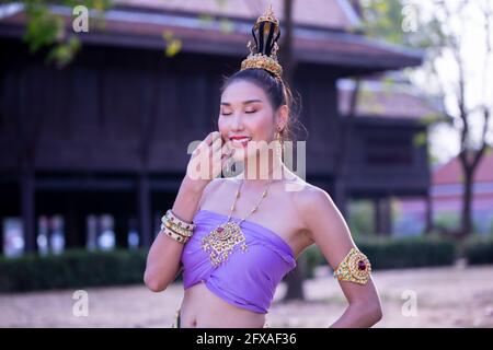 Beautyful Thai woman wearing thai traditional clothing, Beautiful woman, Thai national costume, traditional Thai dress, Thai woman, good mood Stock Photo