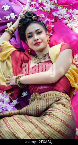 Beautyful Thai woman wearing thai traditional clothing, Beautiful woman, Thai national costume, traditional Thai dress, Thai woman, good mood Stock Photo