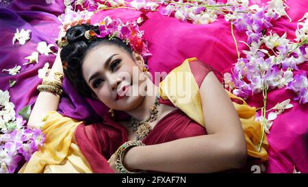 Beautyful Thai woman wearing thai traditional clothing, Beautiful woman, Thai national costume, traditional Thai dress, Thai woman, good mood Stock Photo