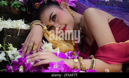 Beautyful Thai woman wearing thai traditional clothing, Beautiful woman, Thai national costume, traditional Thai dress, Thai woman, good mood Stock Photo