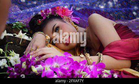 Beautyful Thai woman wearing thai traditional clothing, Beautiful woman, Thai national costume, traditional Thai dress, Thai woman, good mood Stock Photo