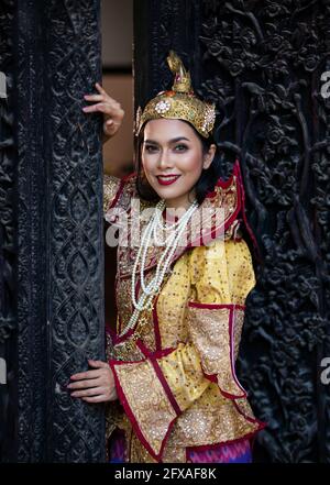 Burmese beautiful woman in antique Myanmar or Burma traditional national dress costume clothes Stock Photo