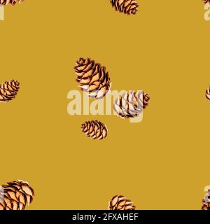 Seamless pattern of small pine cones isolated on yellow background and standing in groups of several pine cones. Winter holidays and autumn concept Stock Photo