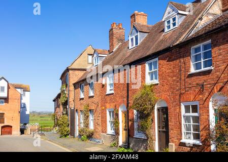 Old Mill workers cottages or houses on Mill street by Tewkesbury Mill Abbey mill water mill Tewkesbury Gloucestershire England GB UK Europe Stock Photo
