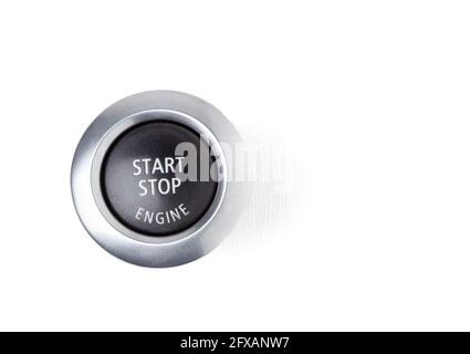 Button start and turn off the ignition of the car engine close-up on the dashboard, electric key, pressing drives the motor vehicle of modern design o Stock Photo