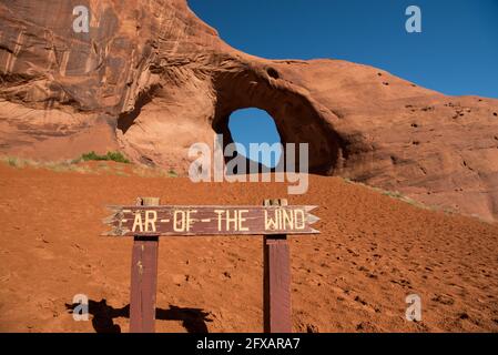 Giant sized hole in rock face at Ear-of-the-Wind arch Stock Photo