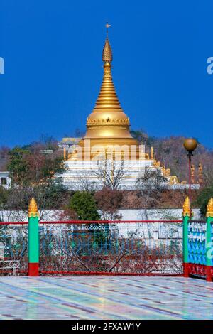 Buddhist temple on Sagaing Hill near the city of Sagaing in Myanmar (Burma).  Many pagodas, temples and monasteries crowd the hills along the ridge ru Stock Photo