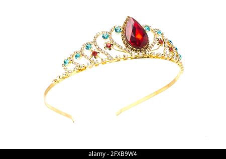gold crown with red ruby stone isolated on white Stock Photo