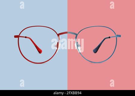 red and blue metal color eye glasses isolated on background, ideal photo template for display or advertising sign or for a web banner Stock Photo