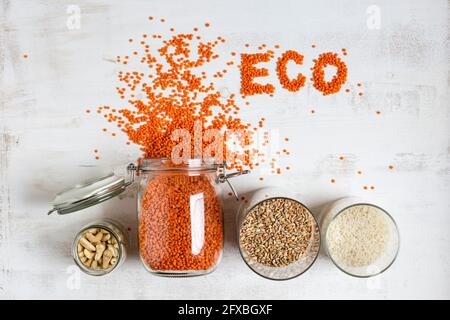 Variation of dried food with Eco text on textured background Stock Photo