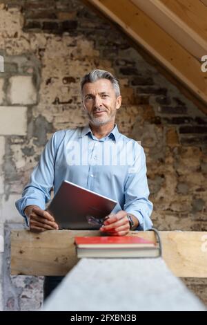 Male architect at constrcution site Stock Photo