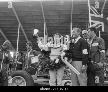 Jim Clark winner Grote Prijs van Nederland in 1963. With wreath and cup. Jim Clark, June 23 1963, Winners, cups, The Netherlands, 20th century press agency photo, news to remember, documentary, historic photography 1945-1990, visual stories, human history of the Twentieth Century, capturing moments in time Stock Photo