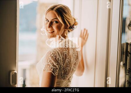 Smiling beautiful blond bride during wedding Stock Photo
