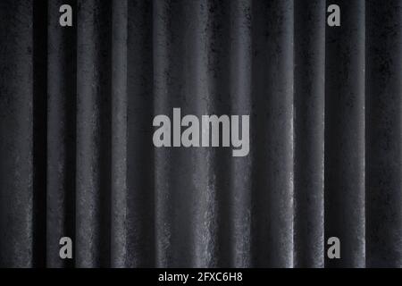 Front view of a folded dark gray curtains or drapes. Abstract high resolution full frame textured background. Stock Photo