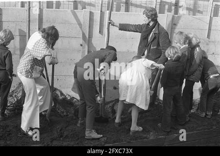 National Tree Planting Day, Amsterdam, Roel van Duijn (right) plants tree, March 28, 1973, tree planting days, The Netherlands, 20th century press agency photo, news to remember, documentary, historic photography 1945-1990, visual stories, human history of the Twentieth Century, capturing moments in time Stock Photo