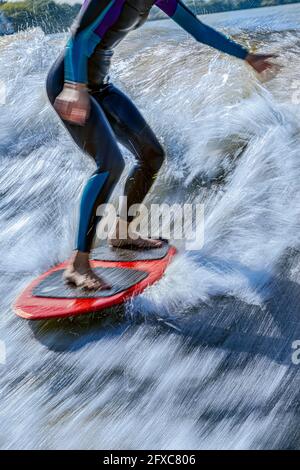 Low section of woman wakesurfing in Moskva river Stock Photo