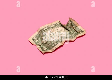 Studio shot of single crumpled one dollar bill Stock Photo