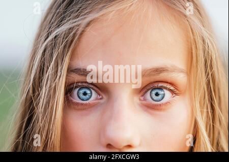 Blond girl with blue eyes Stock Photo