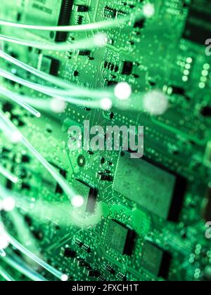 Illuminated fibre optics transferring data Stock Photo