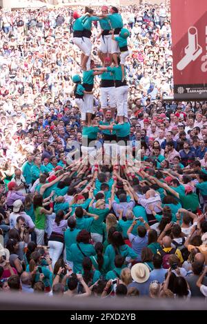 Tarragona, Spain, September 19, 2019 - Girls Climbing Human Castles Tower Stock Photo