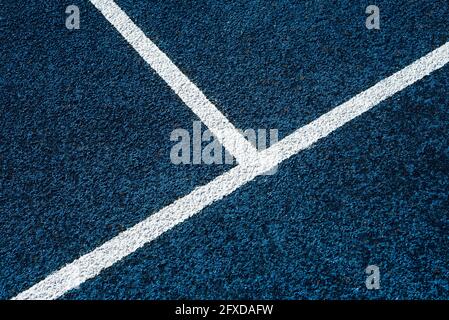 Lines and marks on sports stadium running track Stock Photo