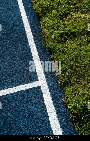 Lines and marks on sports stadium running track Stock Photo