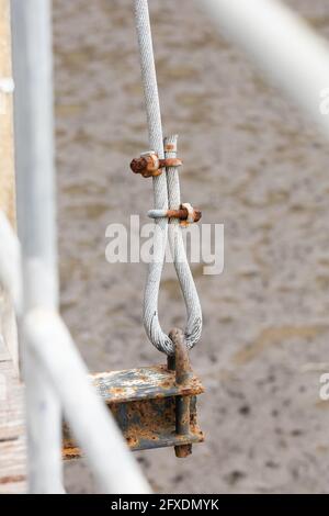 Closeup rusty u-bolt on metal sling Stock Photo