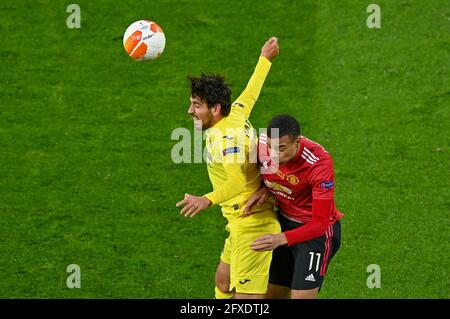 Gdansk, Poland. 26th May, 2021. Daniel Parejo (L) of Villarreal and Mason Greenwood of Manchester United vie for the ball during the UEFA Europa League final match between Villarreal CF and Manchester United in Gdansk, Poland, May 26, 2021. Credit: Lukasz Laskowski/Xinhua/Alamy Live News Stock Photo