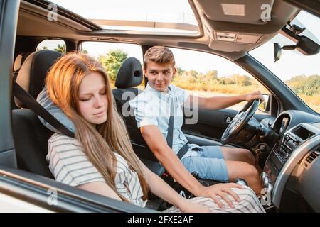 Girlfriend Sleeping Car Traveling Pillow Boyfriend Driving Car Stock Photo  by ©VitalikRadko 202678036