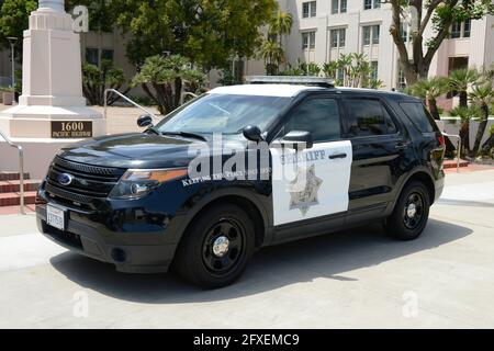 Sheriff vehicle of the San Diego Police Department parked outside the County admin building. Stock Photo