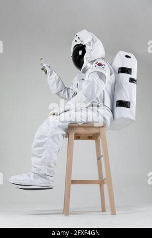 astonaut and virtual reality screen, white background Stock Photo