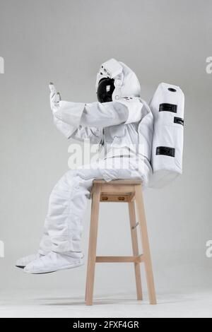 astonaut and virtual reality screen, white background Stock Photo