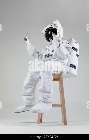 astonaut and virtual reality screen, white background Stock Photo